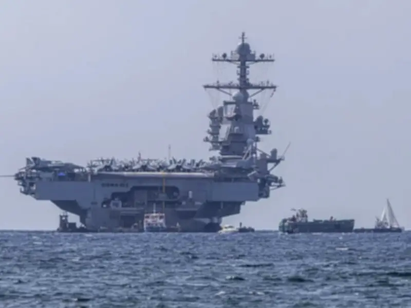 Reino Unido retira personal de Irán por seguridad mientras EE.UU. despliega portaaviones