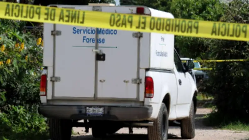 Hallan restos desmembrados de dos personas en bolsas negras en San Pablo Xochimehuacan, Puebla