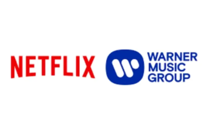 Netflix y Warner Bros. Discovery Forjan Alianza Estratégica para Producciones Musicales
