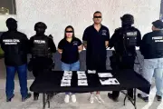 Cae pareja con arma y medio millón de pesos en CDMX
