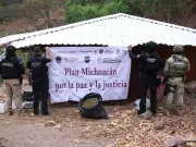 Catean dos inmuebles en Michoacán: aseguran armas y droga