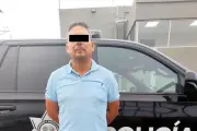 Detienen a hombre armado en estacionamiento de banco en CDMX