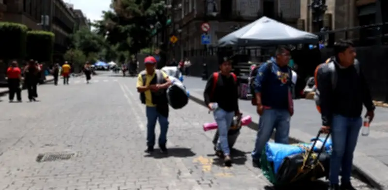 Comerciantes del Centro celebran retiro del campamento de la CNTE