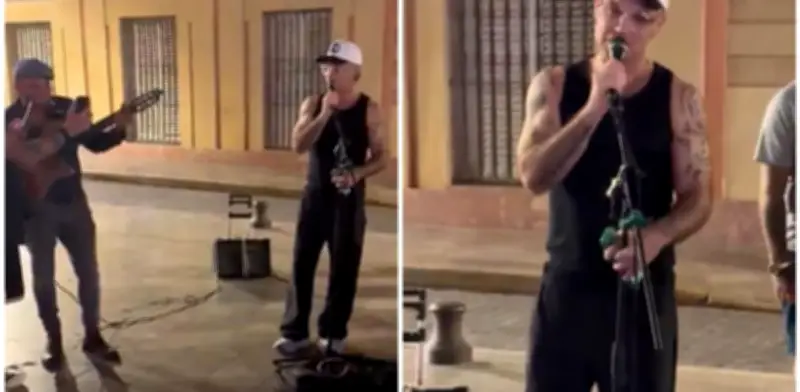 Robbie Williams sorprende al cantar 'Angels' con músico callejero en Sevilla