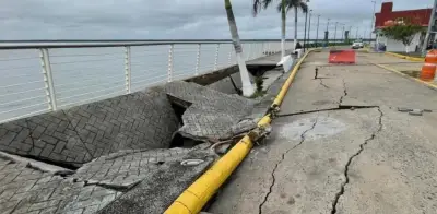 Colapsa parte del malecón de Alvarado por lluvias; Protección Civil acordona la zona